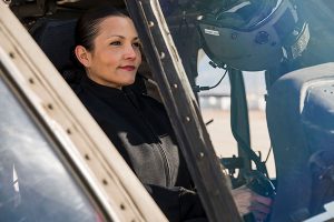 Monica Lujan in an UH-60 Blackhawk.